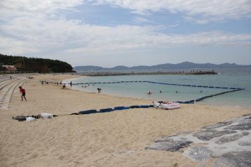 <p>A long and wide beach affords plenty of room to play at this beach mostly undiscovered by tourists</p>