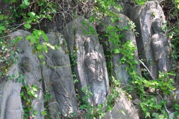 Very old statues halfway up the climb to the top