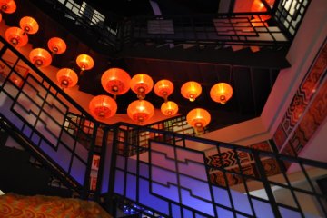 Beautiful red lanterns spiral up the staircase