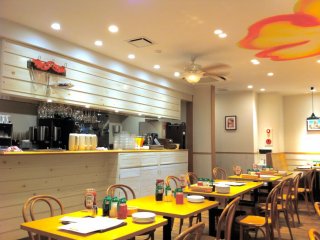 Feel the aloha spirit while seated in the fresh, bright & airy dining room situated right off of Enoshima Island