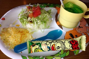 <p>The kid&#39;s taco rice comes with taco rice, hash browned potatoes, a corn snack and choice of beverage</p>