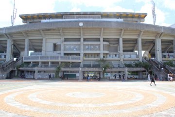 The large apron in front of the stadium is docrated with circular brick patterns mimicing the Okinawan flag