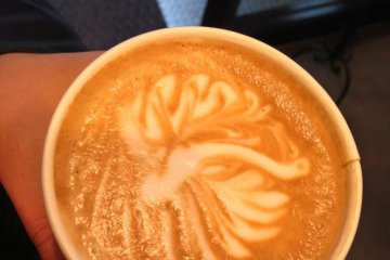 Intricate swirls of Ballon D'essai's art latte