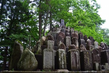 <p>Stones of a&nbsp;Mandala in the grounds of a temple along the road to Kumano&nbsp;Shrine.</p>