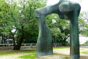 Henry Moore's 'The Arch' is a grand sculpture standing tall in Plaza Moore right by the stairs leading up to the MOCA