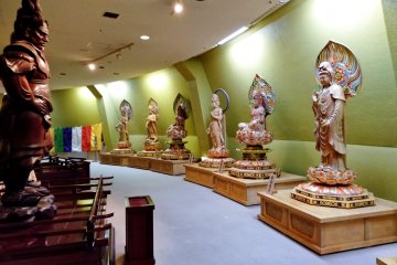 Sculptures relating to Buddhism litter the ground floor of the interior.
