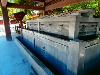 A rare tap-shaped chozuya (a place to cleanse yourself before praying)