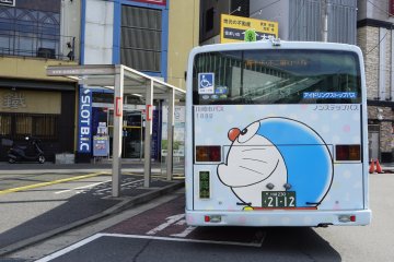 Stepping out of Noborito Station and you will be greeted by a Doraemon shuttle bus