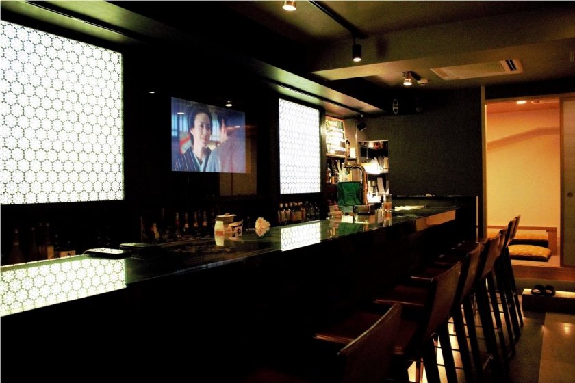 The bar offers a very different atmosphere from the sushi counter right beside it