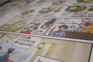 The placemats feature a clever manga about the shop owners at Breaq!