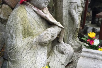 Statues and flowers are found all over the grounds