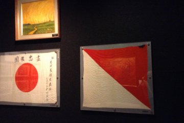 ธงญี่ปุ่นติดกับธงที่ใช้ในการส่งสัญญาณ