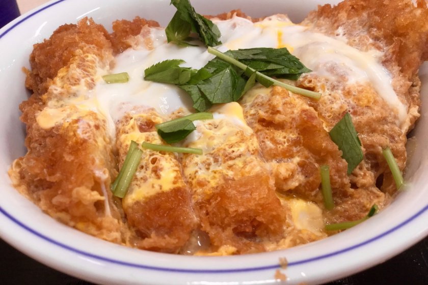 Katsudon, rice bowl topped with deep fried pork cutlet  and egg sauce.