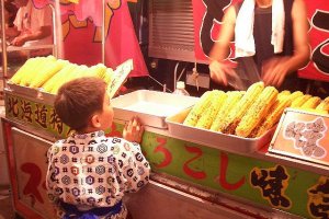 Grilled corn, a staple of the summer festival street stall scene