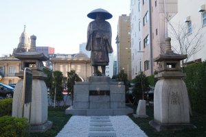 Statue of sect founder, Shinran Shonin, by the entrance to the temple grounds