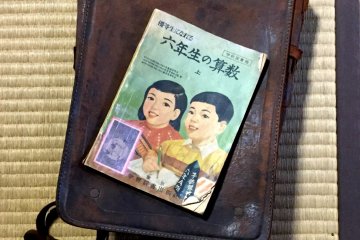 School bag and math textbook 