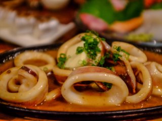 The squid rings served on a steaming plate with miso sauce is an interesting combination I hadn't tried before, and it is delicious