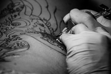 Japanese tattoo artist at work
