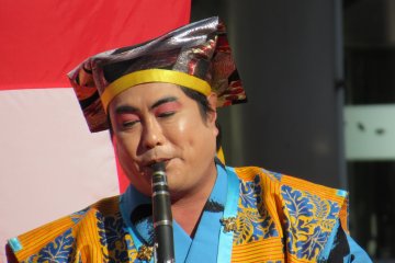 Музыкант на фестивале в Сугамо