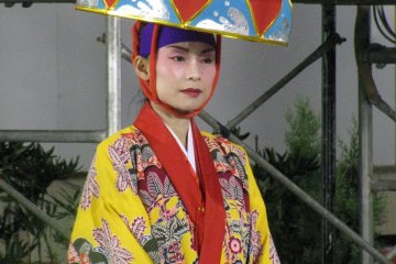 A dancer wearing an Okinawan costume