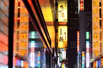 <p>The colorful neon advertisements light up the whole area.</p>