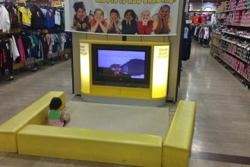 The kids play area isn't terribly large, but is a great place to temporarily place a child while trying apparel on