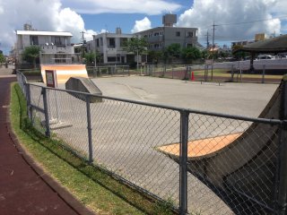 I haven&#39;t seen too many skateboard parks in Okinawa, but there is a halfpipe - really it&#39;s two quarterpipes - and a few grind rails available inside a fenced-in area of Misato Park