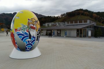 A giant rugby ball in front of the museum