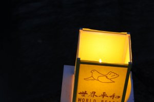 A solitary lantern on the river