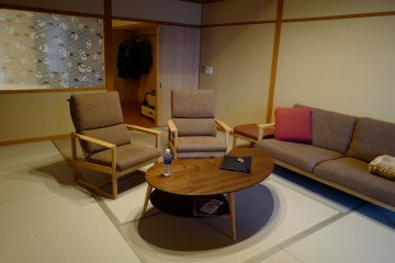 The tatami sitting room is relaxing and used for futon beds at night