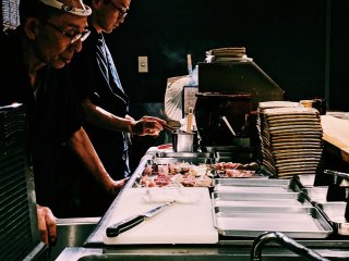 The yakitori chefs preparing the meal