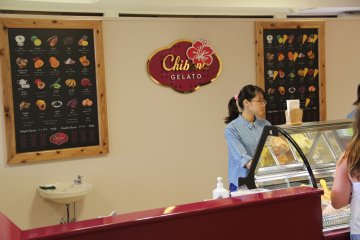 <p>The colorful pictures on the faux chalkboard signs at Chibana Gelato show all of the flavors it offers, although only 10 are available at any given time</p>