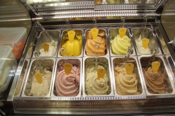 <p>This is gelato, baby! It&#39;s frozen and whipped, and each flavor has its own scoop so that you won&#39;t have to taste chocolate on your banana gelato waffle cone</p>