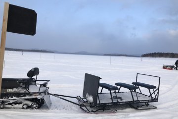 Snowmobile and sledge