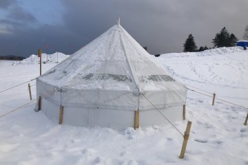 A snowy tent