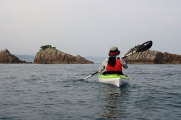 Kayaking to the Hashigui Rocks and see them close up is a great experience. 