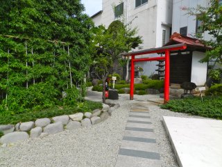 Behind the cafe and soba shop is the pebbled courtyard, with the information centre and gift shop.