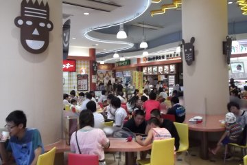 <p>The lively food court</p>