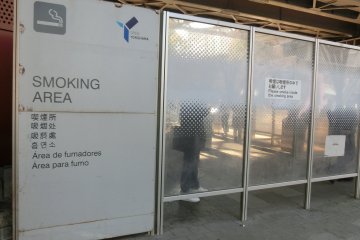 Outside designated smoking area next to JR Kannai Station.