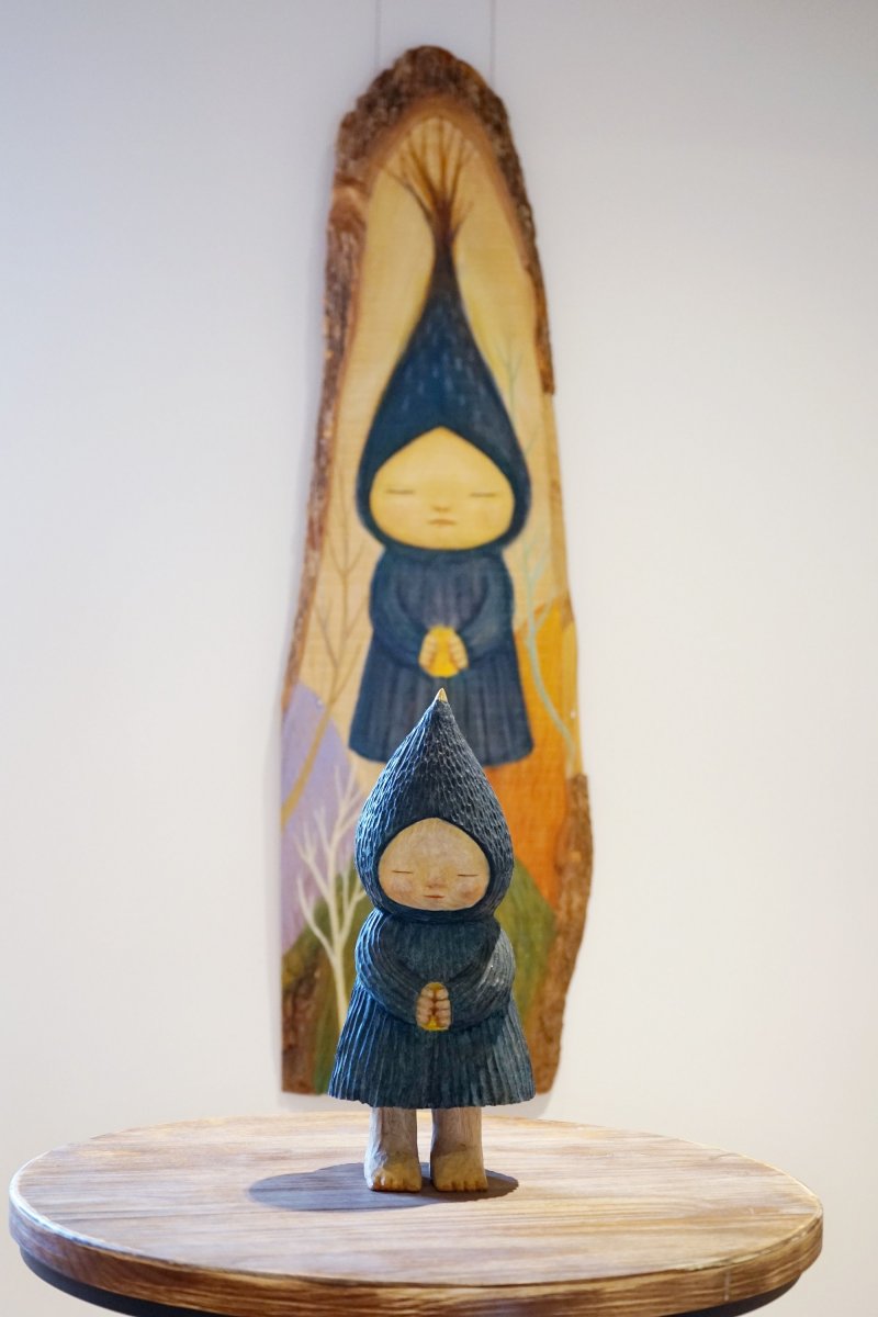 Nakamura's works are made from carved camphor logs which are then painted with oil paint