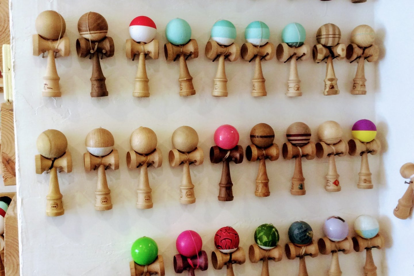 Rows of Su Lab kendama for playing with