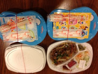 Two kids curry sets and one spicy beef adult set with steamed rice for a total of 1,500 yen