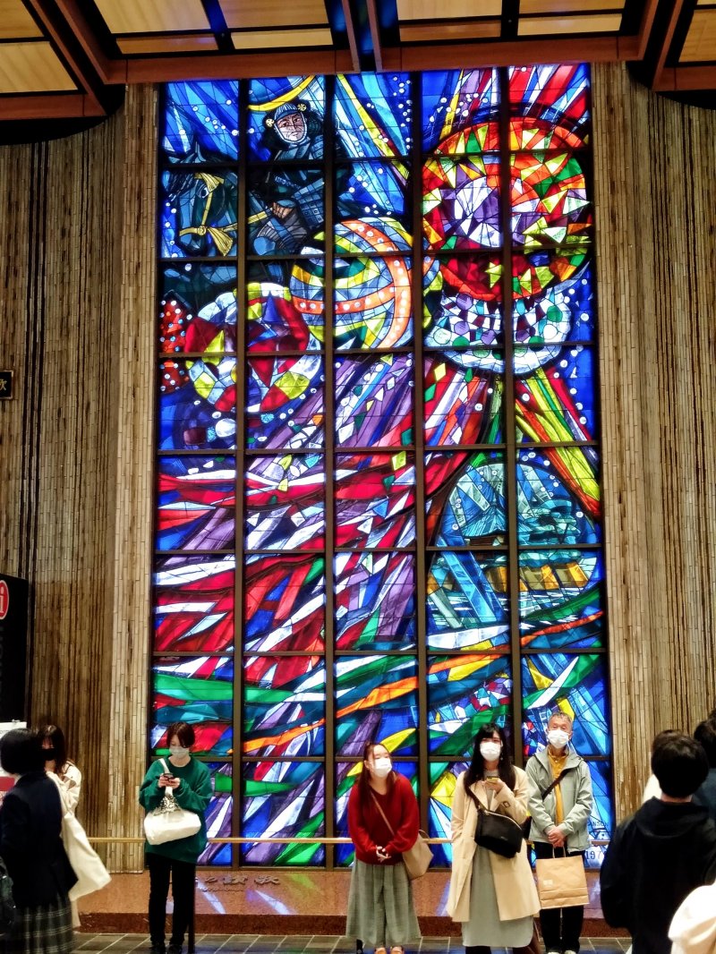 The famous second floor "stained glass" meeting spot features Date Masamune, Tanabata decorations and a Matsushima temple. 