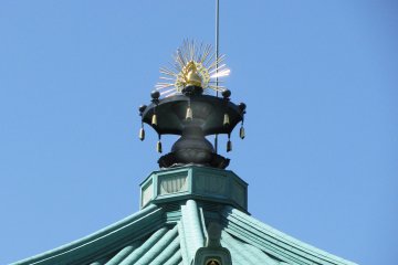 The flaming pearl on top of the temple
