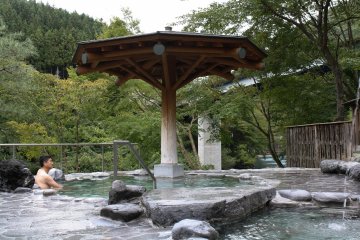 The male open air bath overlooking the pristine Shima river