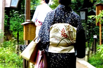 Woman in kimono with autumn obi