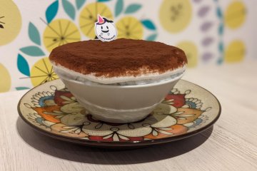 Tiramisu: mascarpone base with flavours of caramel and nuts, finished with a velvety milk foam topped with cocoa powder