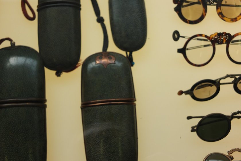 Old glasses and cases on display