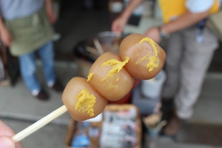 Tama Konnyaku found at Yamagata festivals garnished with mustard