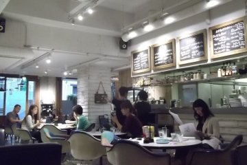 <p>Customers relax and browse the menu</p>